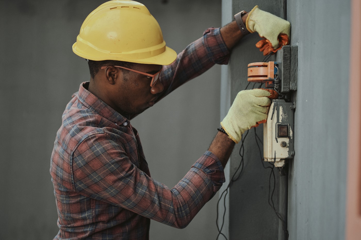 Home systems technician inspecting equipment